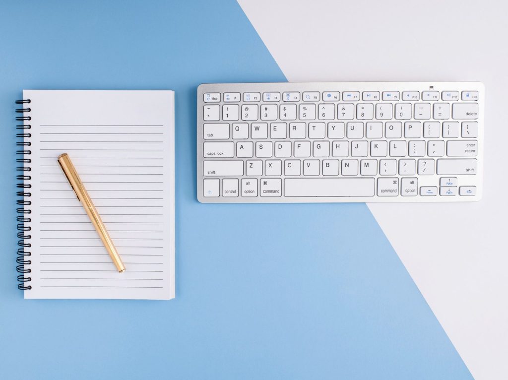 Computer keyboard and notepad